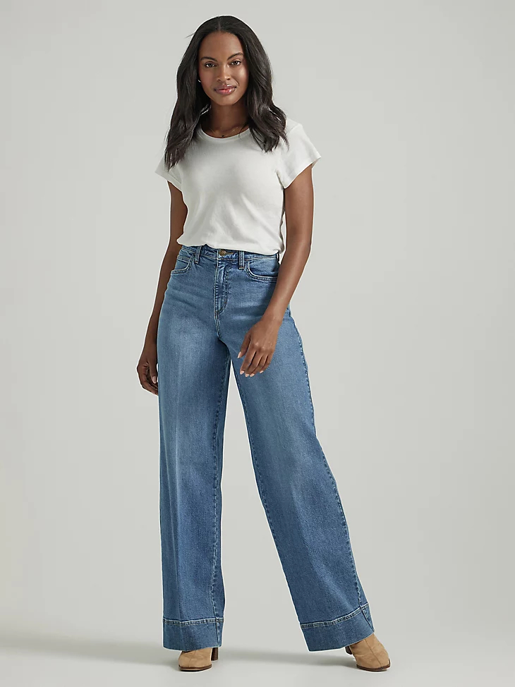 Wide leg trouser jeans, often referred to as "flares" or "bell-bottoms," have a rich and storied history that spans across several decades and cultural movements.